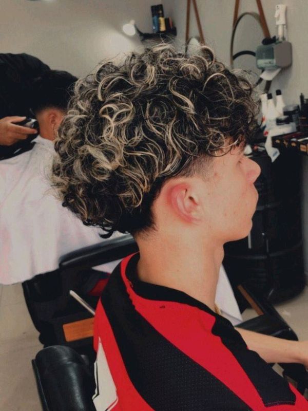 Low Taper Fade With Messy Fluffy Hair