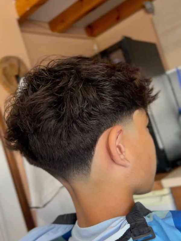 Mid Taper Fade With Fluffy Hair